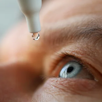 Eye Doctor Plainfield IL Glaucoma BOX A glaucoma patient applying medicated eye drops to their eye